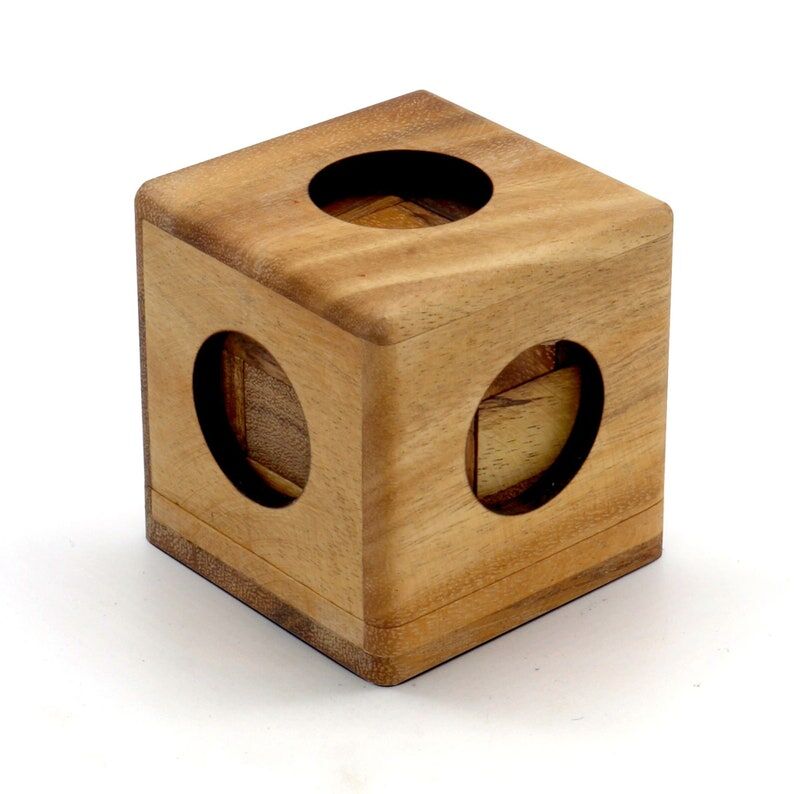 3 individual brainteaser wooden puzzles in a gift wooden box Price