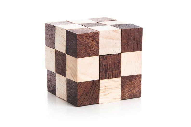 3 individual brainteaser wooden puzzles in a gift wooden box Price