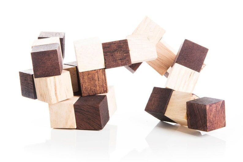 3 individual brainteaser wooden puzzles in a gift wooden box Price